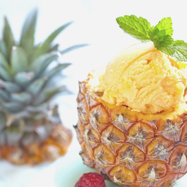 fruit sorbet ice cream in small pineapple