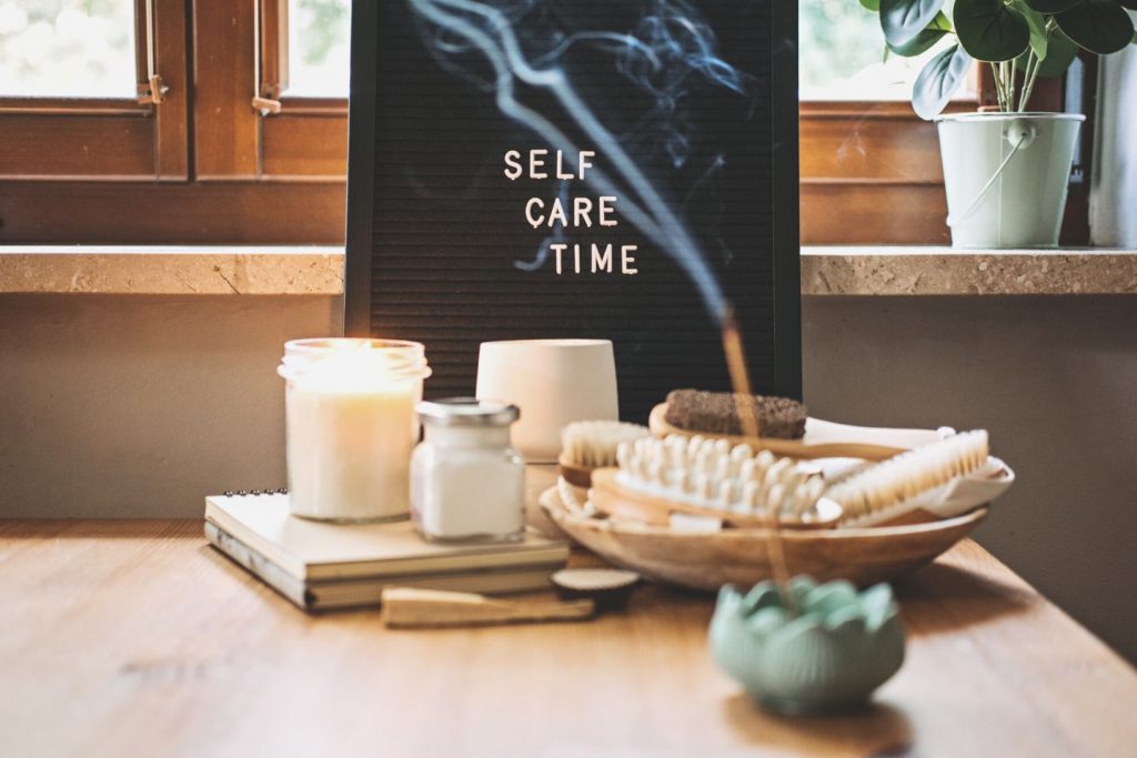 self-care, wellness concept with letter board text self-care
