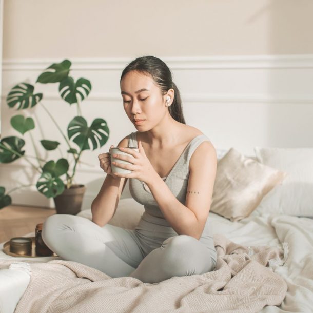 woman drinking a cup of tea