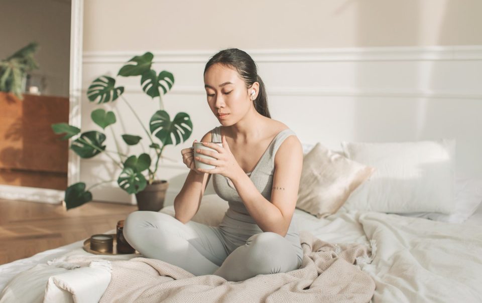woman drinking a cup of tea